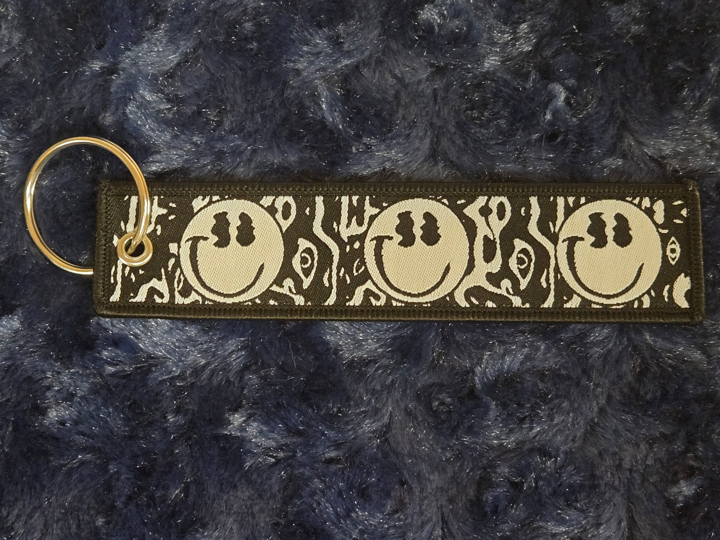 Wavey Smiley Flight Tag Keychain